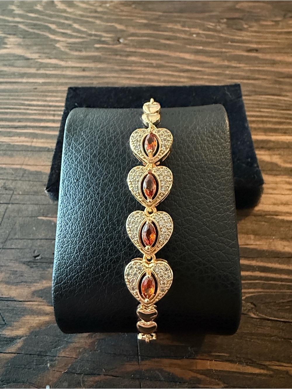 Gold-Tone Heart Link Bracelet with Garnet-Red Stones & Zirconia